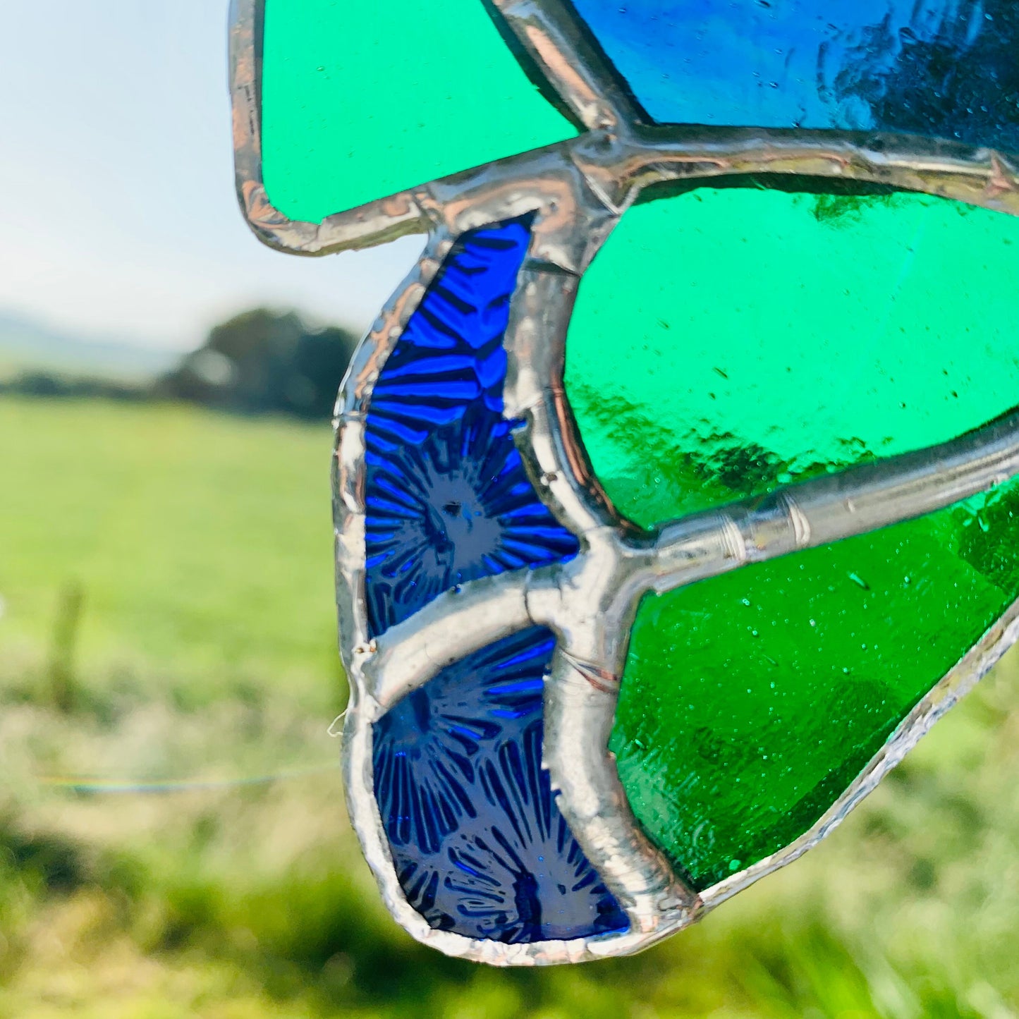 Green Stained Glass Butterfly Suncatcher: Handcrafted Window Decor