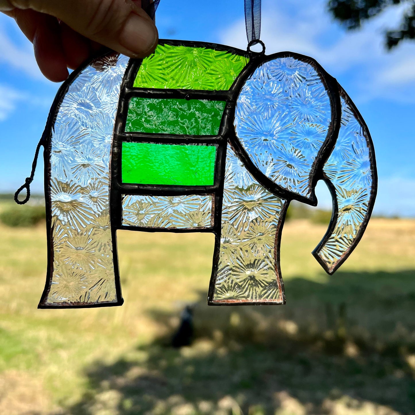 Pretty Elephant Stained Glass Suncatcher in shades of Emerald Green with iridescent body ….