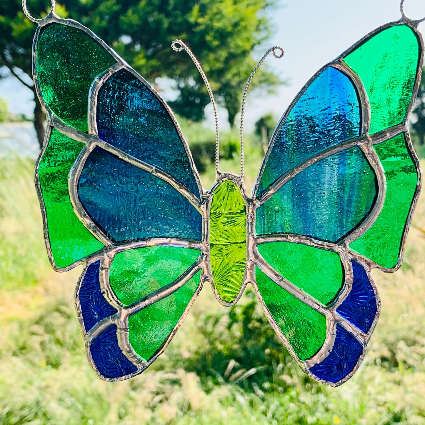 Green Stained Glass Butterfly Suncatcher: Handcrafted Window Decor