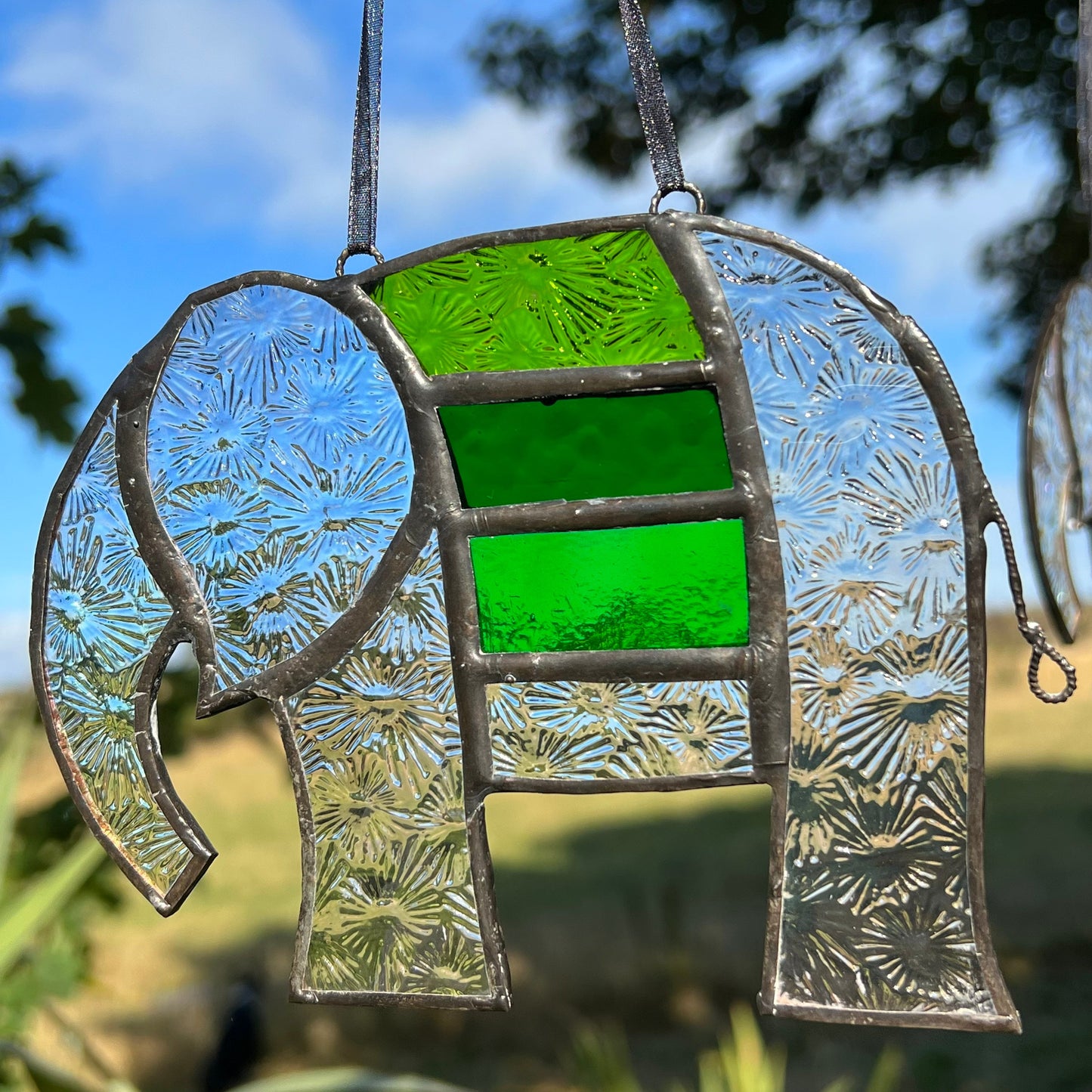 Pretty Elephant Stained Glass Suncatcher in shades of Emerald Green with iridescent body ….