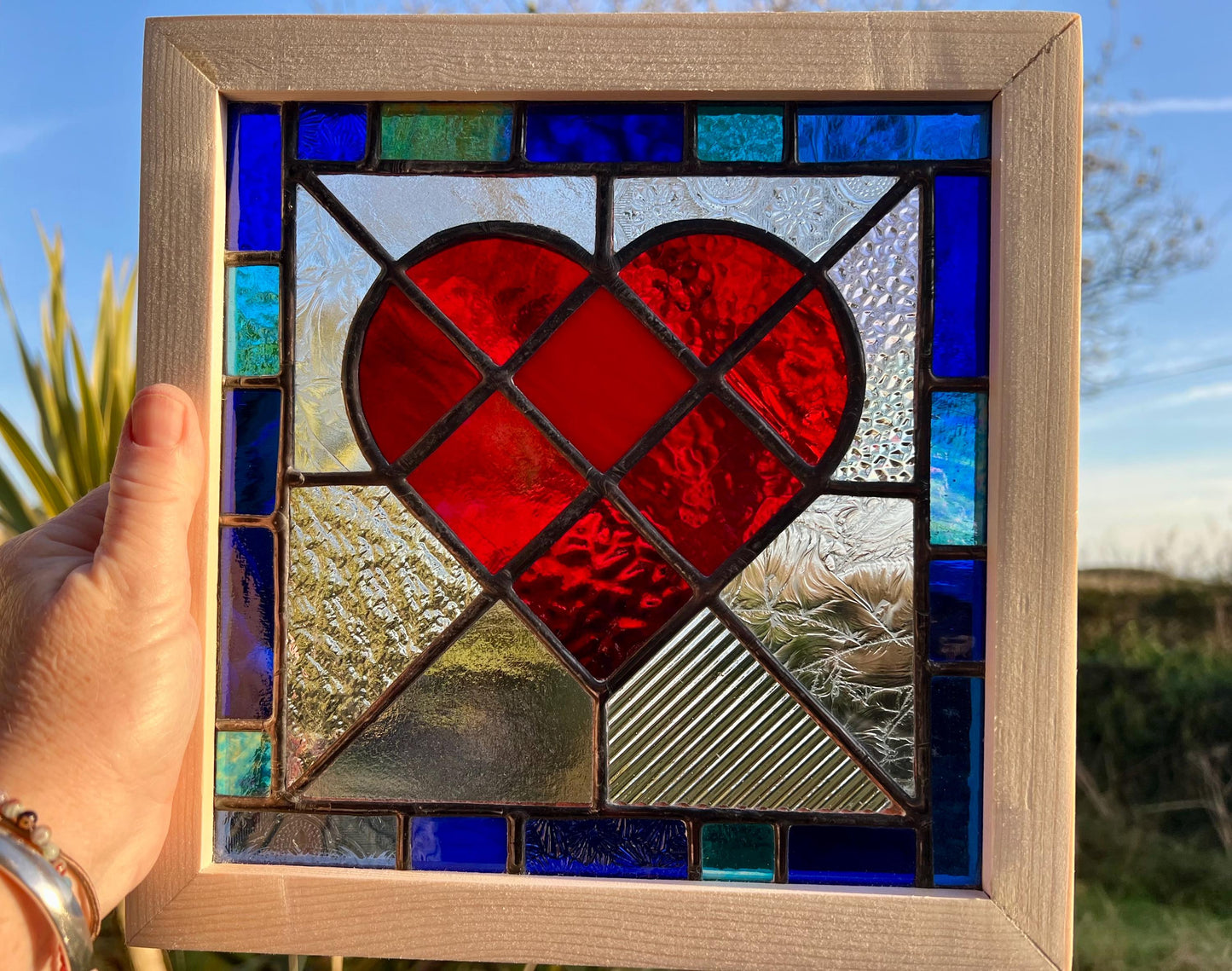 Handcrafted Stained Glass Heart: Ruby Red, Cobalt & Turquoise Border