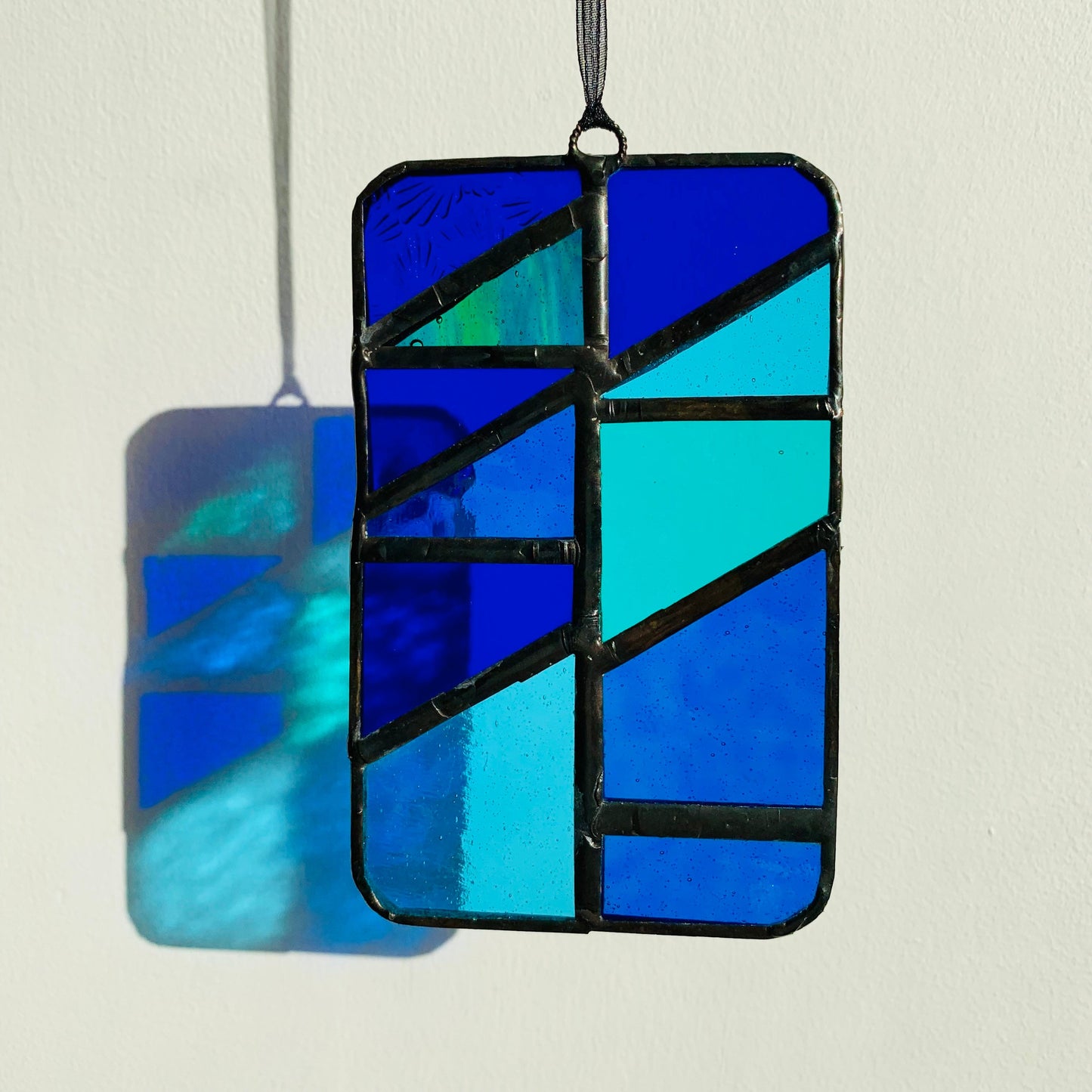 Handcrafted Stained Glass Suncatcher: Ocean Blue Geometric Design