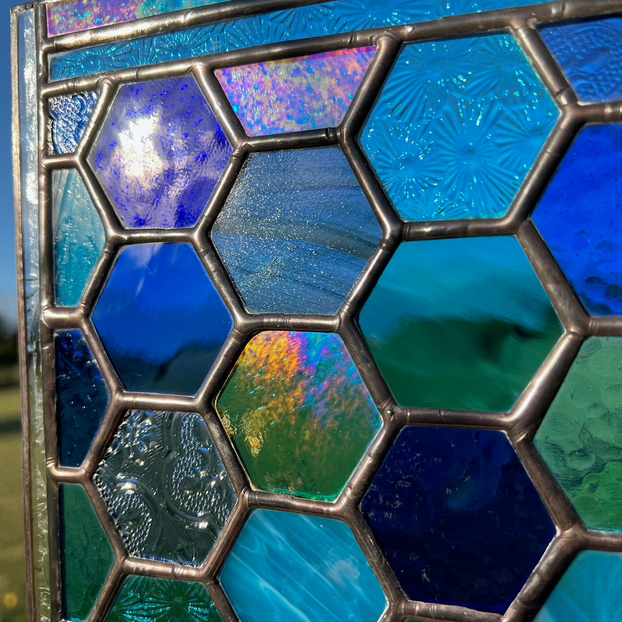 Stained Glass Honeycomb Panel in deep  blues and turquoise including lots of textures.