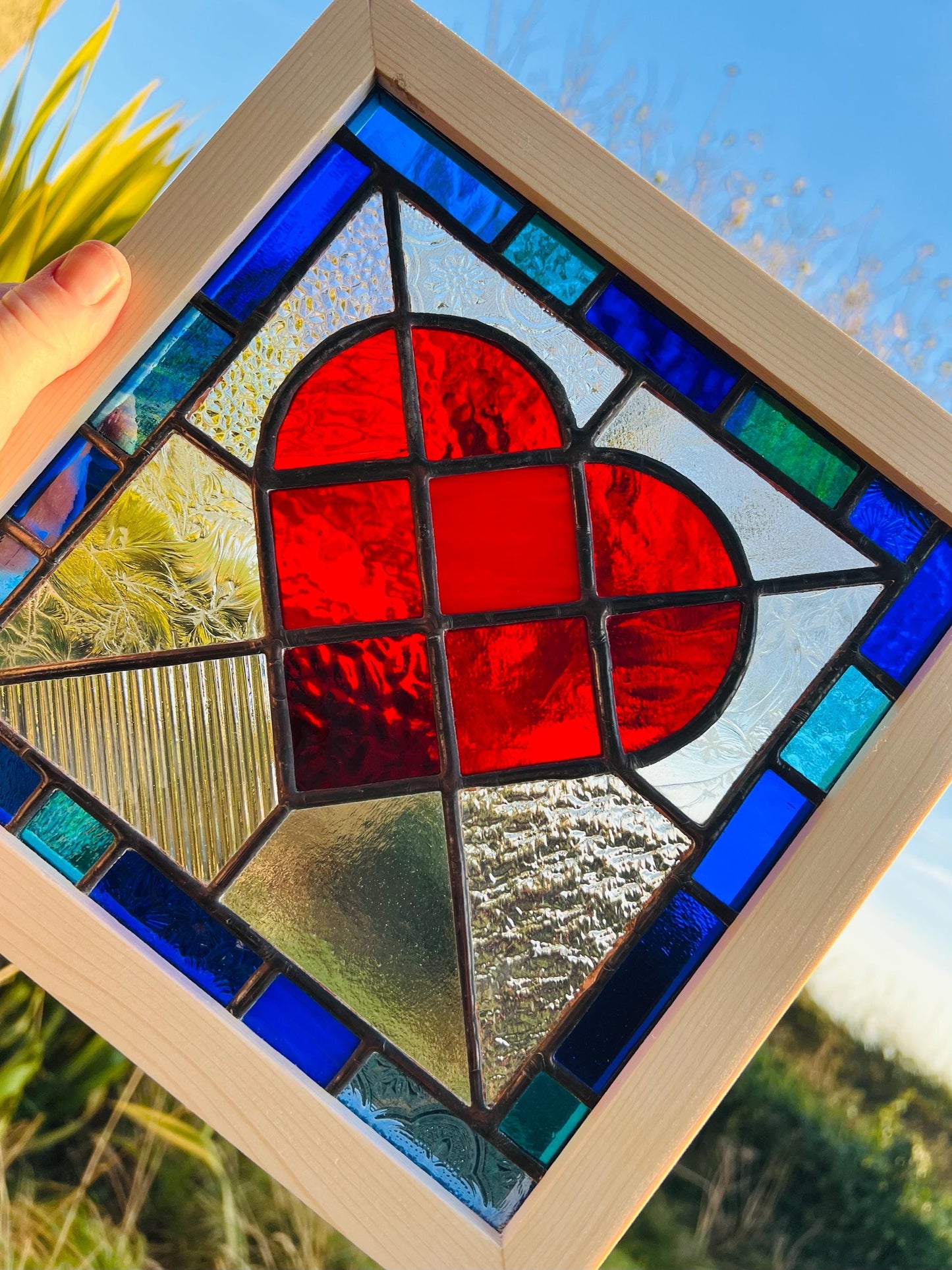 Handcrafted Stained Glass Heart: Ruby Red, Cobalt & Turquoise Border