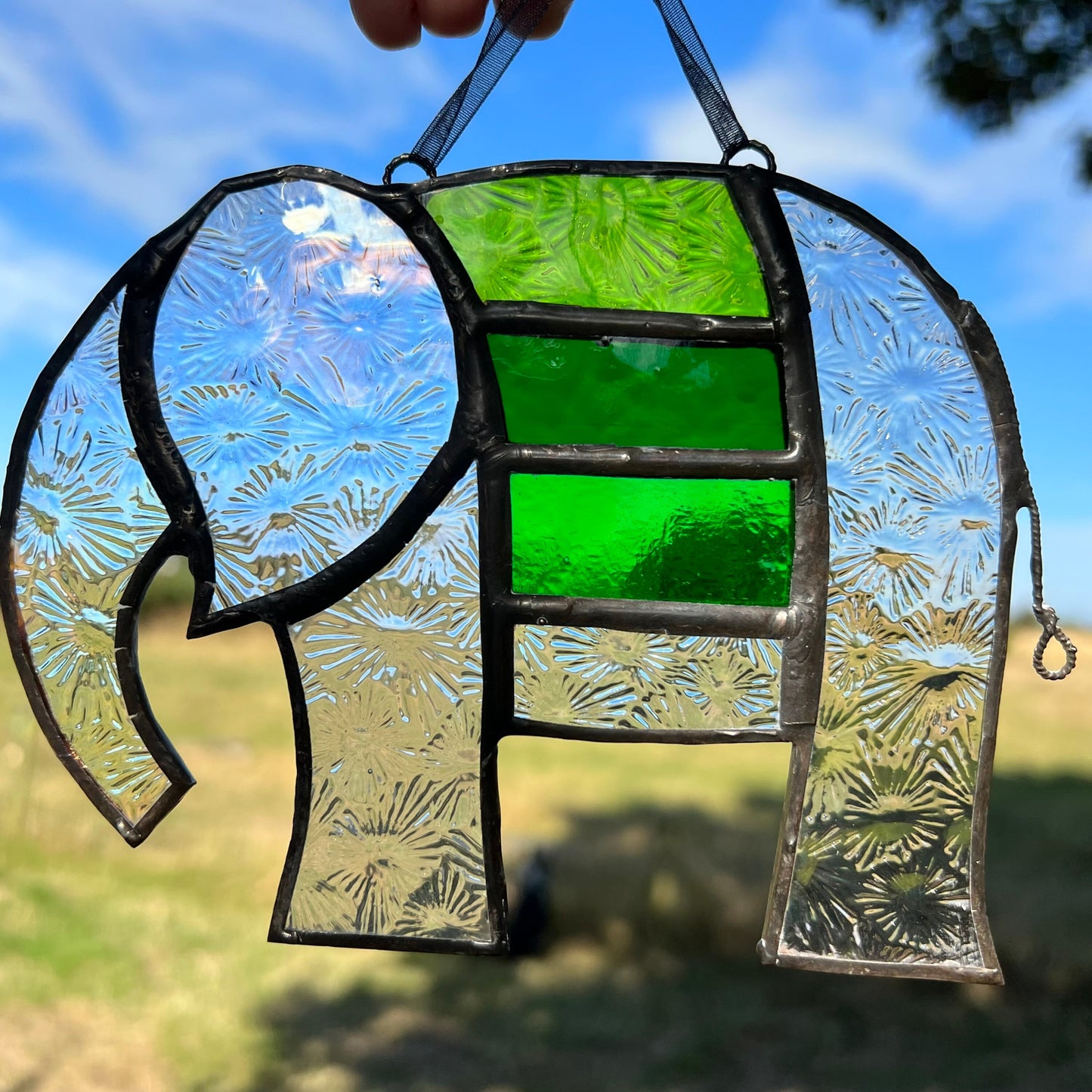 Pretty Elephant Stained Glass Suncatcher in shades of Emerald Green with iridescent body ….