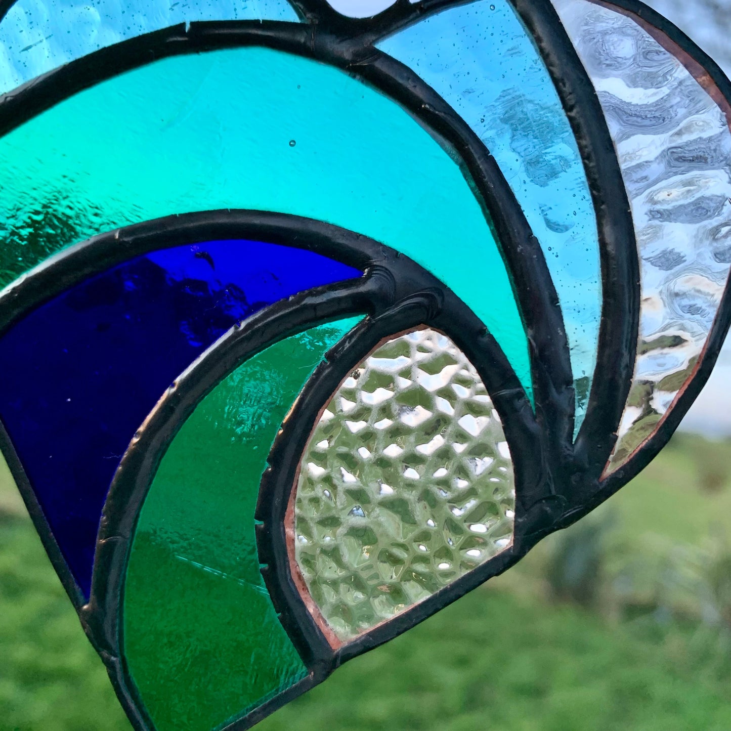 Stained Glass Heart Suncatcher: Sea Blue Wave with Iridescent Star