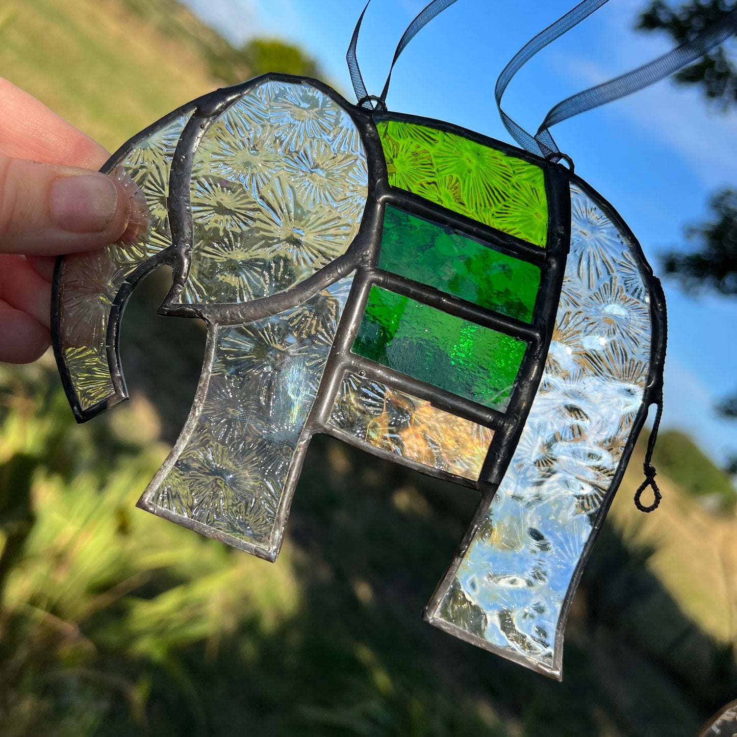 Pretty Elephant Stained Glass Suncatcher in shades of Emerald Green with iridescent body ….
