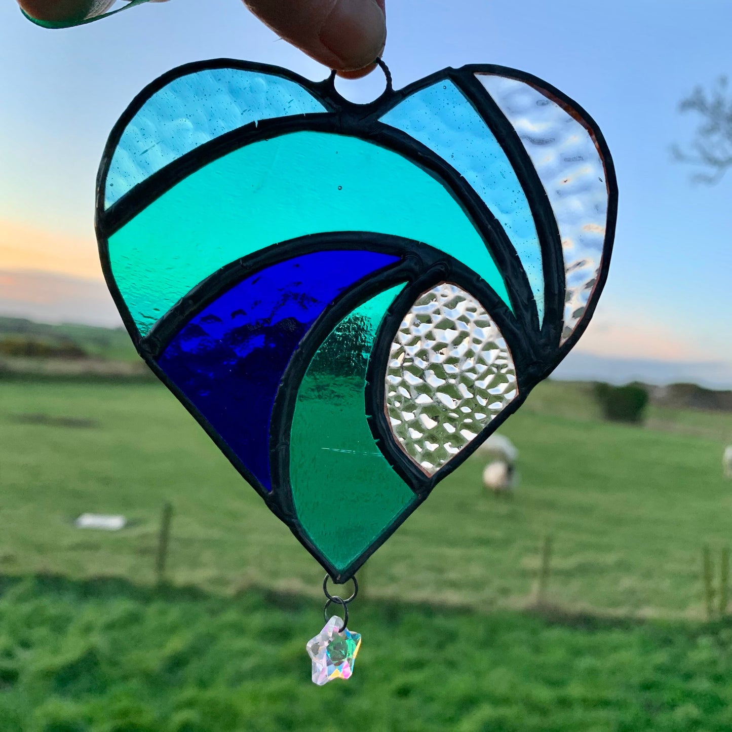 Stained Glass Heart Suncatcher: Sea Blue Wave with Iridescent Star