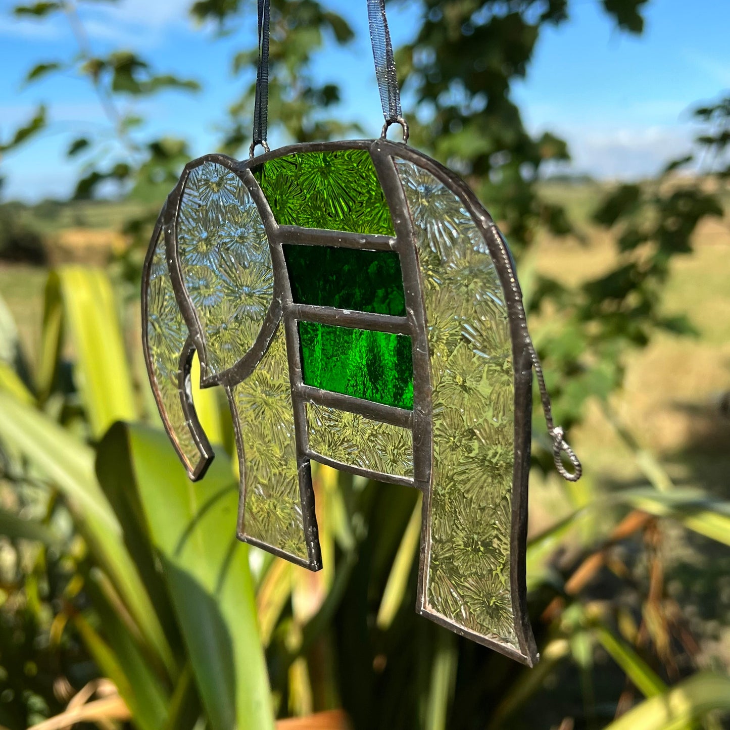 Pretty Elephant Stained Glass Suncatcher in shades of Emerald Green with iridescent body ….
