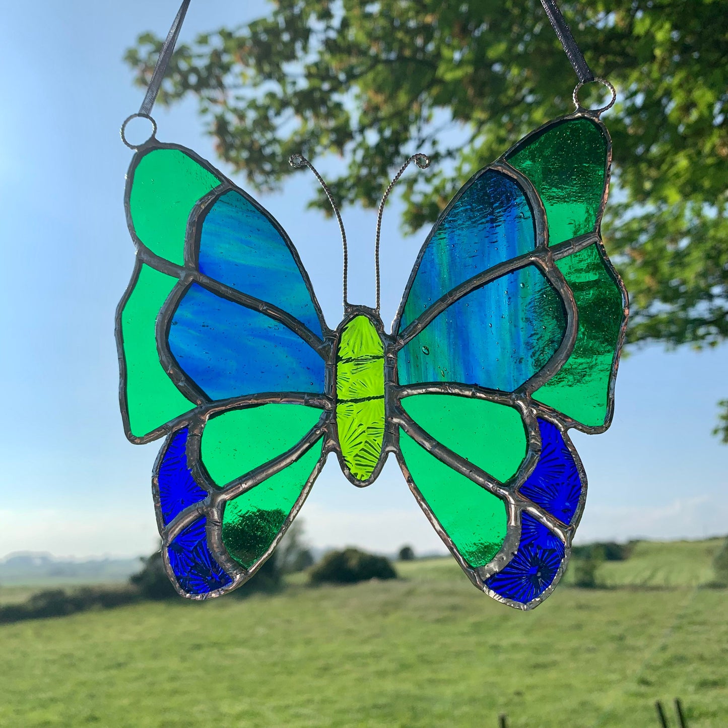 Green Stained Glass Butterfly Suncatcher: Handcrafted Window Decor