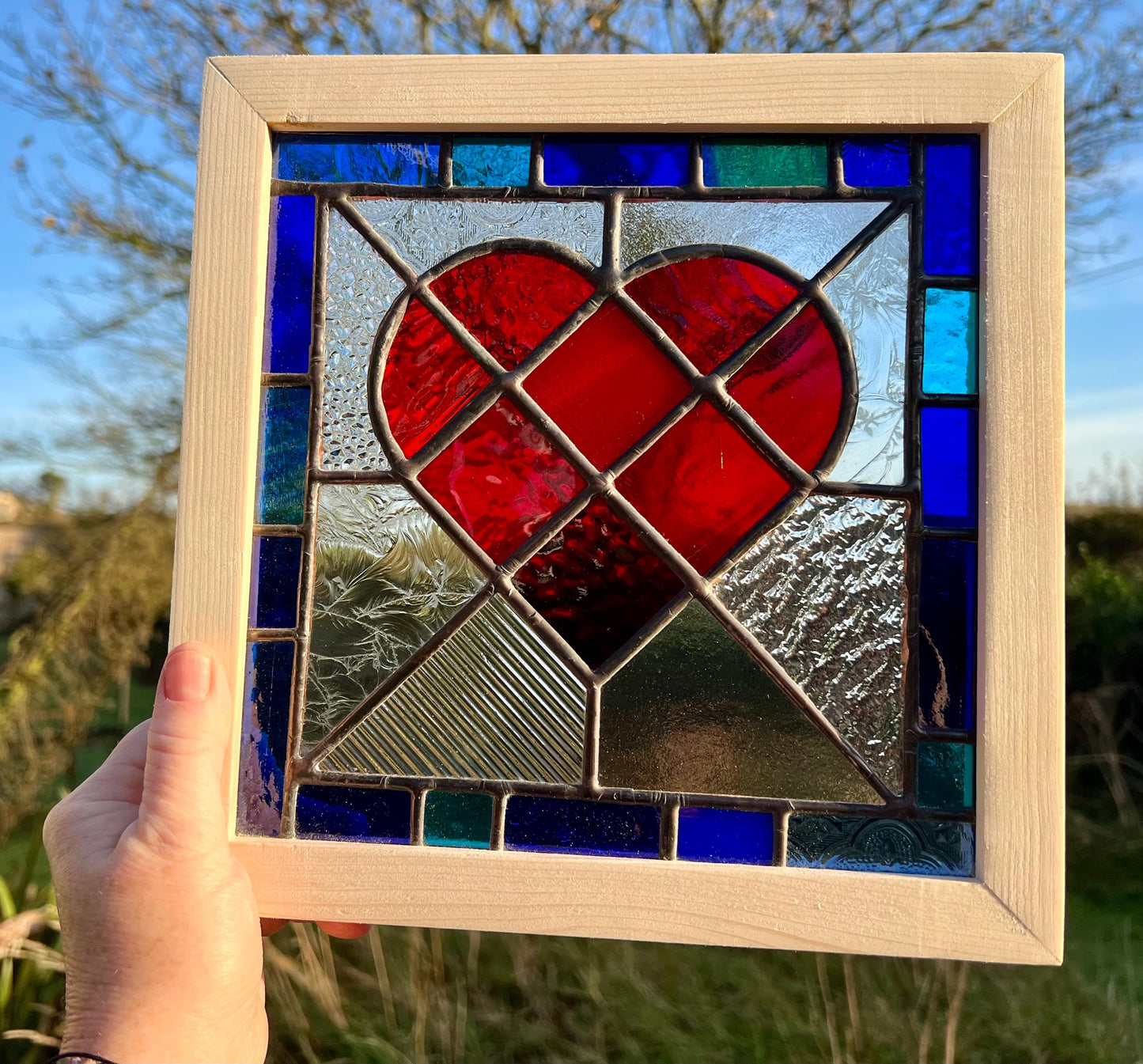 Handcrafted Stained Glass Heart: Ruby Red, Cobalt & Turquoise Border