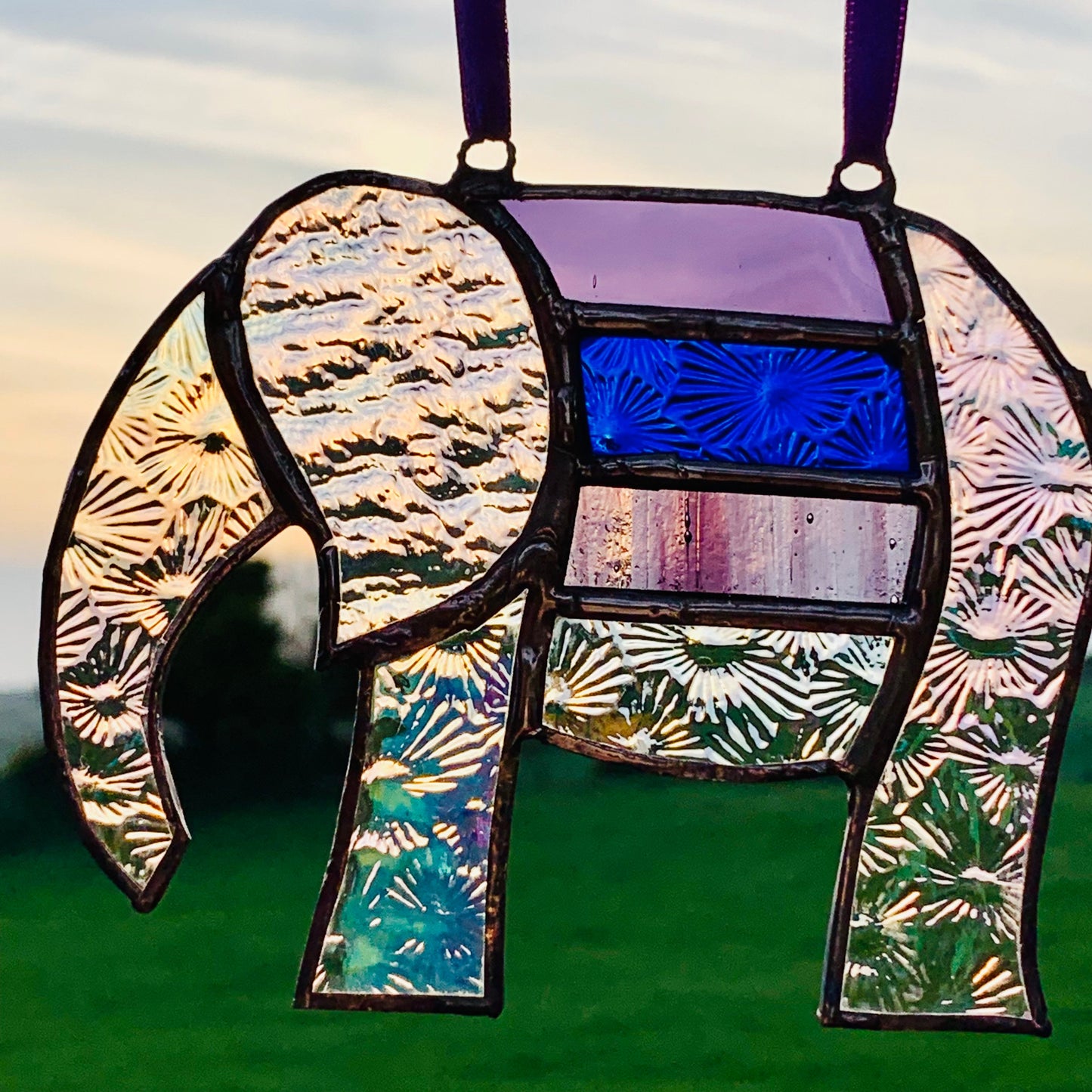 Pretty Elephant Stained Glass Suncatcher in shades of purple with iridescent ..