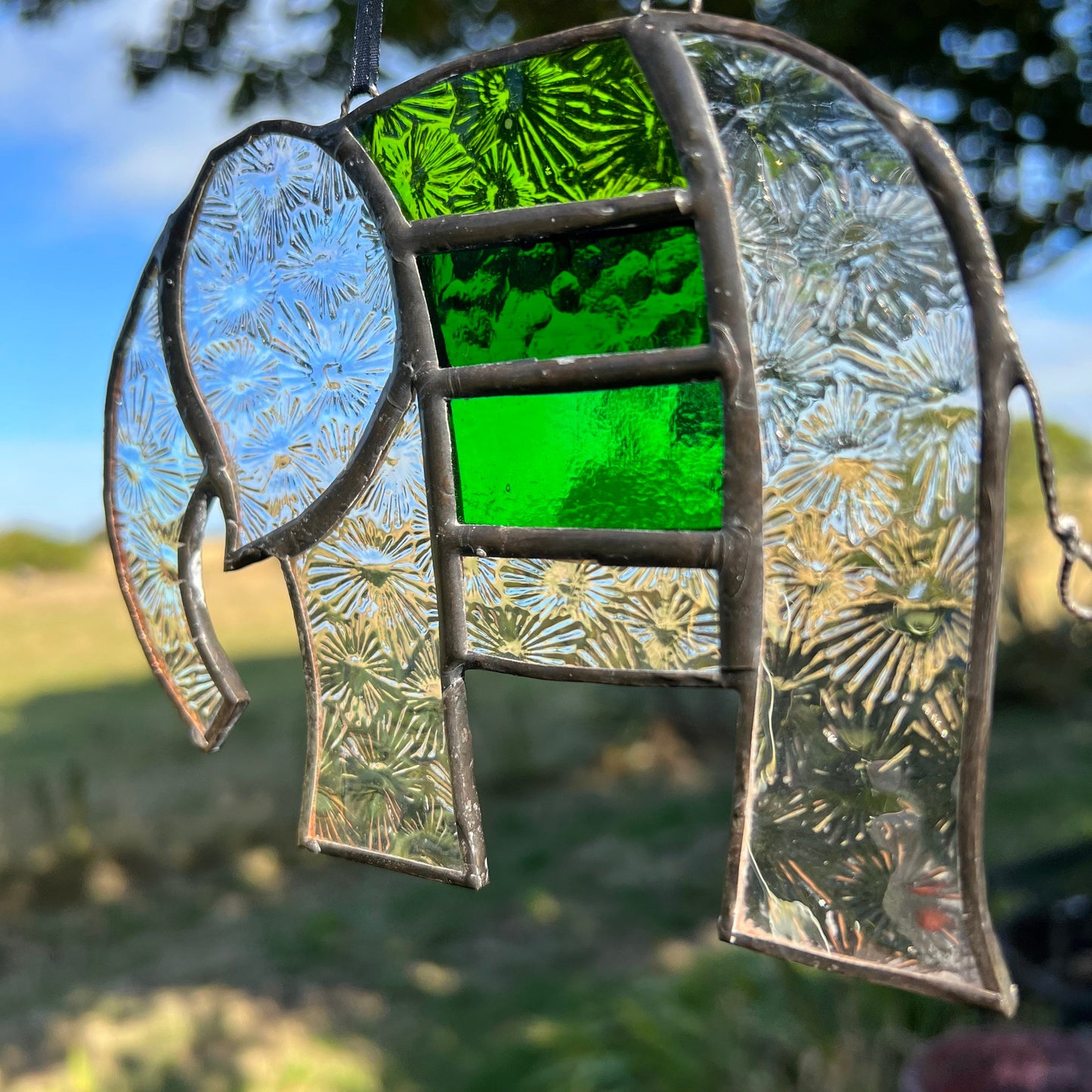 Pretty Elephant Stained Glass Suncatcher in shades of Emerald Green with iridescent body ….